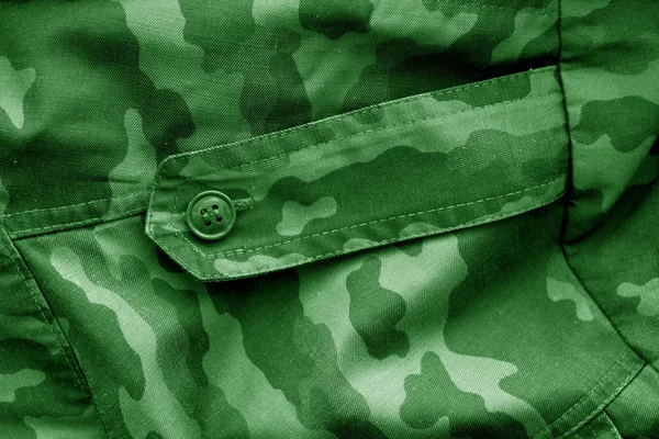 Dirty camouflage cloth in green tone. — Stock Photo, Image