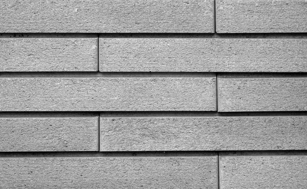 Pared de ladrillo decorativa en blanco y negro . — Foto de Stock