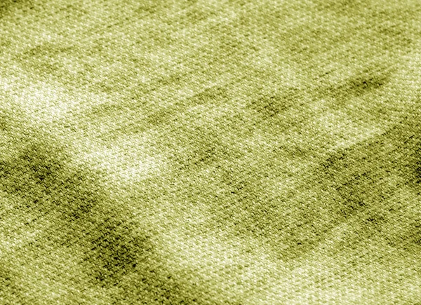 Textura de tela de algodón en tono amarillo . — Foto de Stock