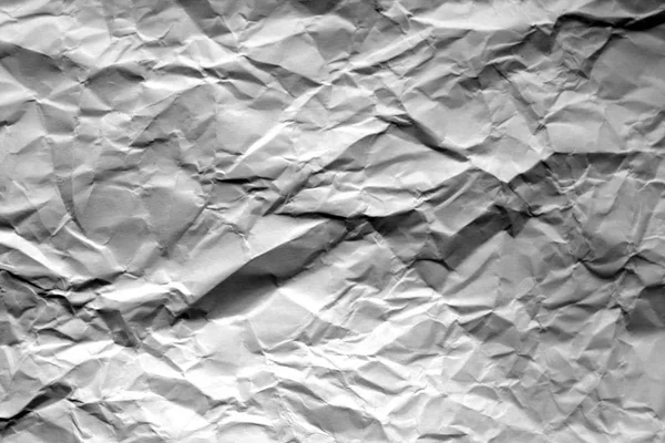 Folha de papel enrugada a preto e branco . — Fotografia de Stock