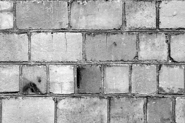 흑인과 백인에 있는 오래 된 지저분한 벽돌 벽 표면. — 스톡 사진