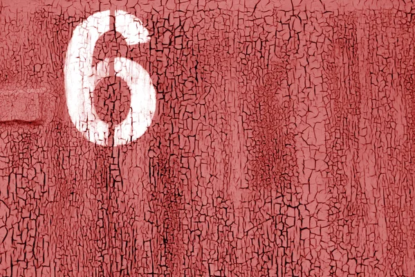 Number 6 in stencil on rusty metal wall in red color. — Stock Photo, Image