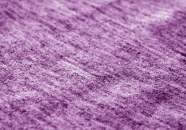 Textil textura con efecto difuminado en tono púrpura . — Foto de Stock