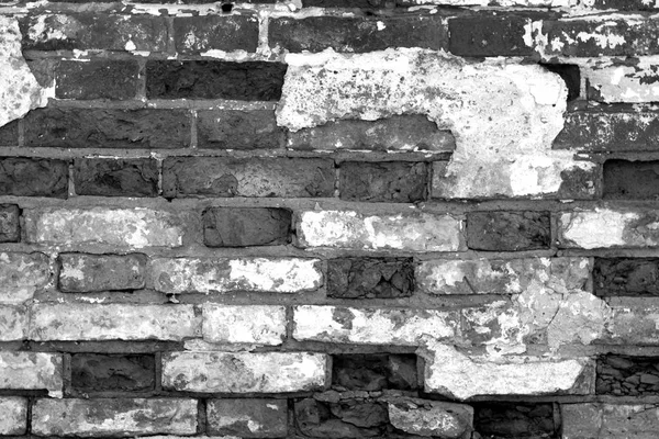 Vieille surface murale en brique grunge en noir et blanc . — Photo