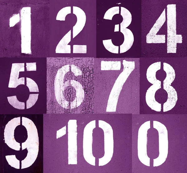 Numbers 0 to 10 in stencil on metal wall in purple tone. — Stok fotoğraf