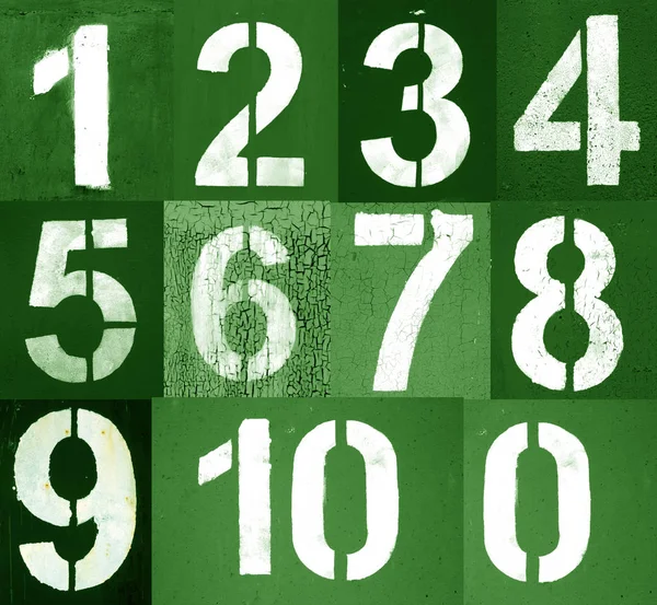 Numbers 0 to 10 in stencil on metal wall in green tone — Stock Photo, Image
