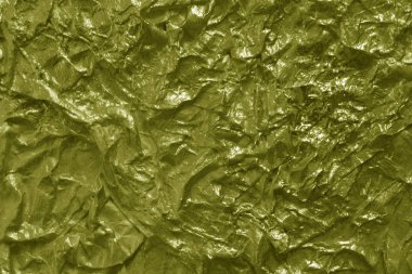 Sarı renkli metal folyo doku.