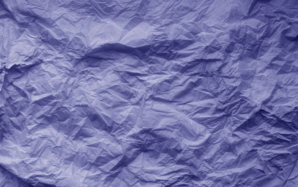 Crumpled sheet of paper in blue color. — Stock Photo, Image