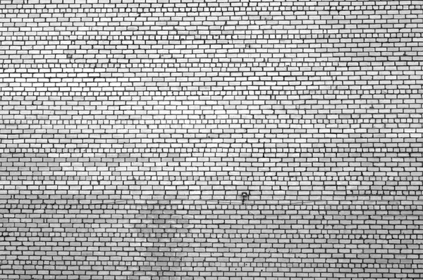 흑백의 흐림 효과와 벽돌 벽의 패턴. — 스톡 사진
