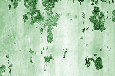 Yeşil tonda Grungy paslı metal duvar yüzeyi.