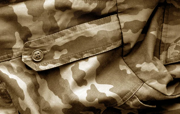 Vojenská uniforma vzor s efekt rozostření v hnědý tón. — Stock fotografie