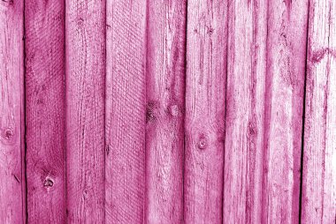 Eski grungy ahşap plakalar pembe tonda arka plan.
