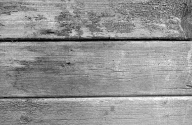 Eskimiş ahşap duvarlar siyah beyaz.