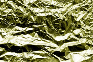 Sarı renkli metal folyo doku.