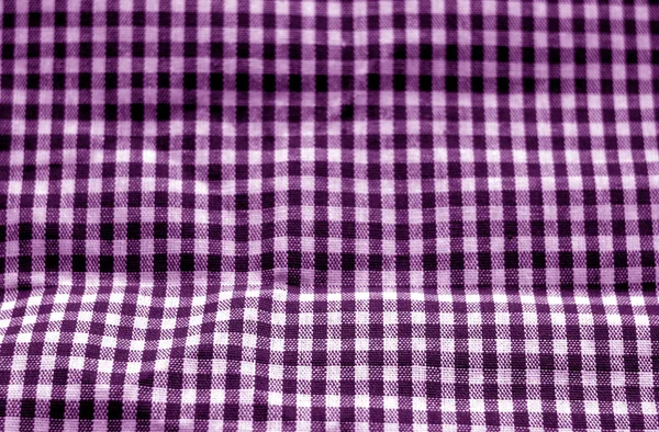 Проверка текстуры ткани в эффекте размытия в фиолетовом цвете . — стоковое фото