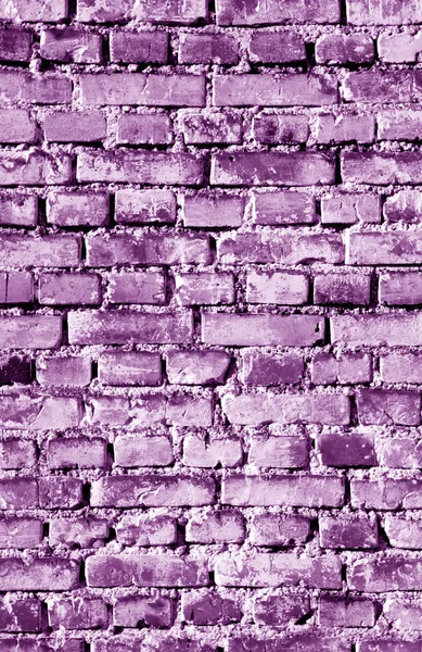 Stary grungy cegły ściany powierzchni w fioletowy odcień. — Zdjęcie stockowe