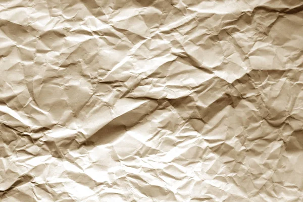 Folha de papel amassada com efeito borrão em tom castanho . — Fotografia de Stock