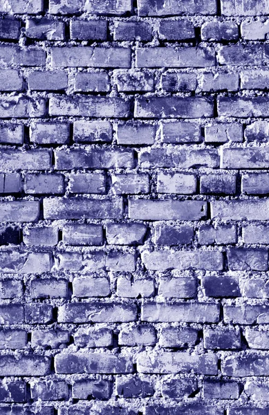 Old grungy brick wall surface in blue tone. — Stock Photo, Image