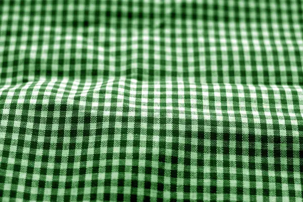 Checked fabric texture in blur effect in green tone. — Stock Photo, Image