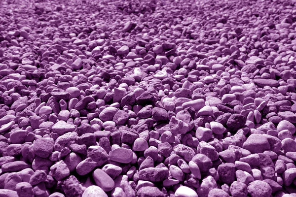 Pile of small gravel stones in purple tone. — Stock Photo, Image