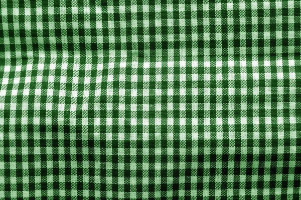 Checked fabric texture in green tone.