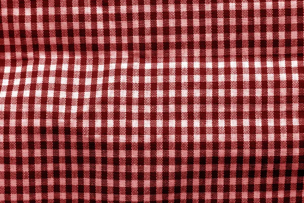 Текстура ткани проверена красным тоном . — стоковое фото
