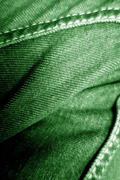 Jeans su gamba primo piano in colore verde . — Foto Stock