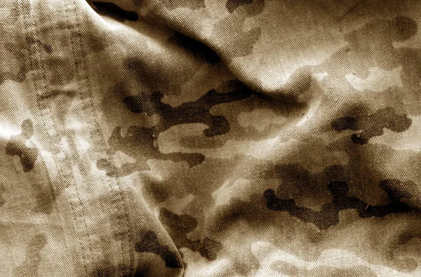 Dirty camouflage cloth with blur effect in brown tone. — Stok Foto