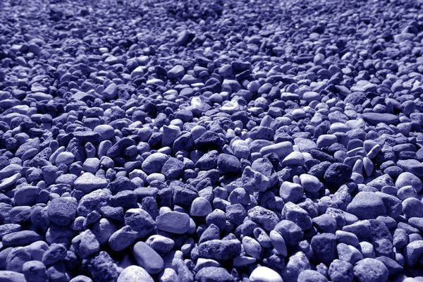 Montón de pequeñas piedras de grava en tono azul . —  Fotos de Stock