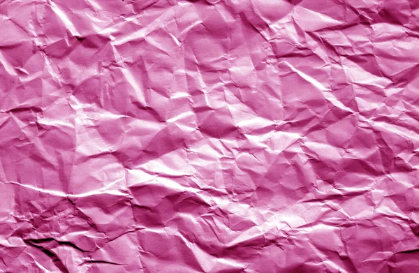 Foglio di carta stropicciato con effetto sfocatura in colore rosa . — Foto Stock