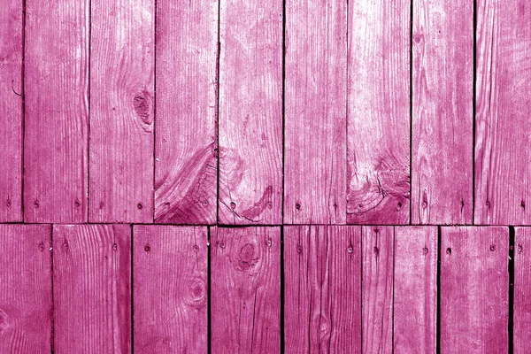 Eski grungy ahşap plakalar pembe tonda arka plan.