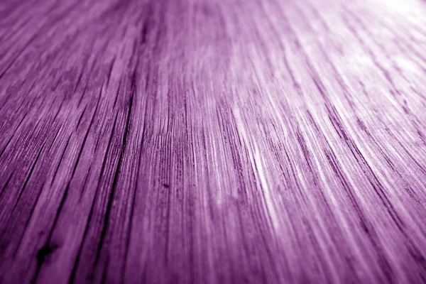 Houten board textuur met wazig effect in paarse tinten. — Stockfoto