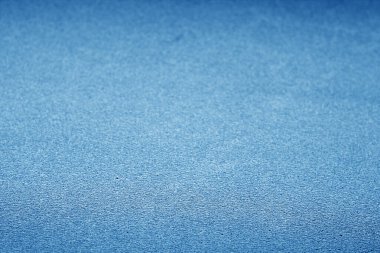 Lacivert renkte bulanık efektli plastik parıltılı doku.
