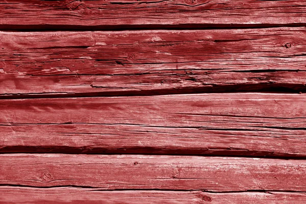 Stará dřevěná zeď v červené barvě. — Stock fotografie