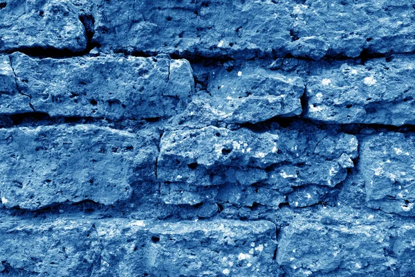 Old grungy brick wall texture in navy blue tone. — Stock Photo, Image