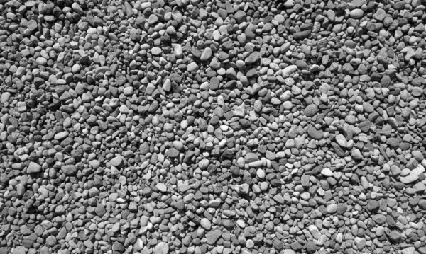 Stos małych kamieni żwirowych w czerni i bieli. — Zdjęcie stockowe