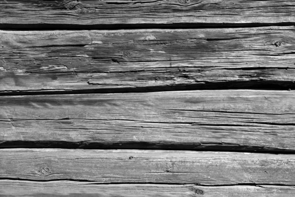 Alte Holzwand in schwarz-weiß. — Stockfoto