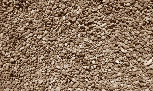 Куча мелких гравийных камней коричневого оттенка . — стоковое фото