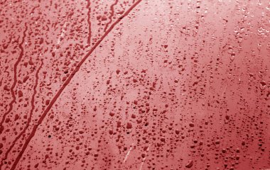Islak plastik şeffaf eski doku kırmızı tonda sarın..