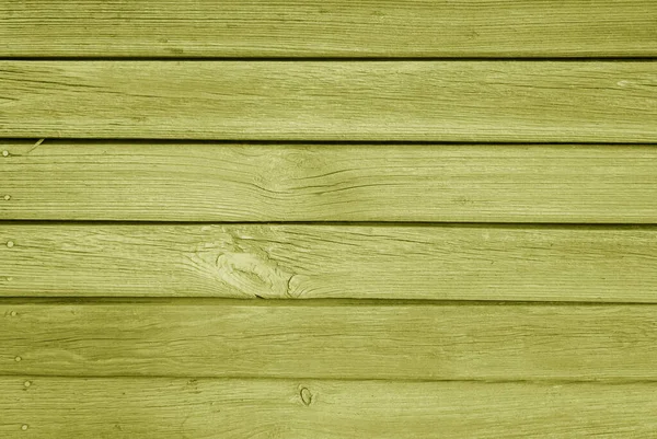 Oude grungy houten planken achtergrond in gele kleur. — Stockfoto