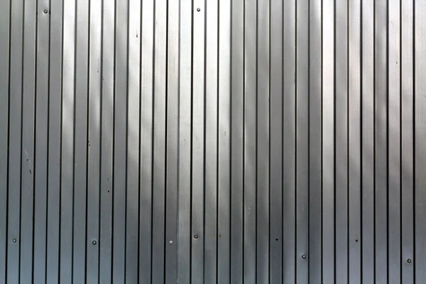 Lista de metal parede textura de cerca . — Fotografia de Stock