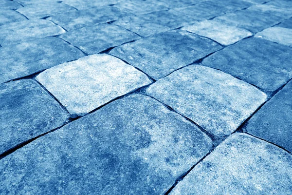 海軍青のトーンで石の歩道や石畳の道路 建築的背景と質感 — ストック写真