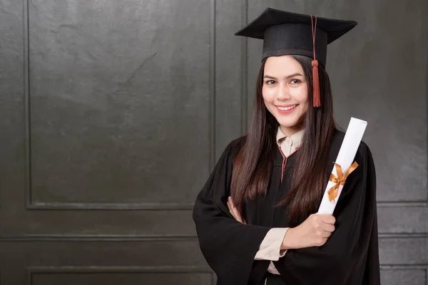 Portrait Young Woman Graduation Gown Smiling Cheering Black Background — Stock Photo, Image