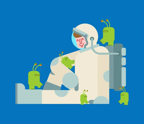 Astronaut och små gröna utomjordingar. vektor illustration — Stock vektor
