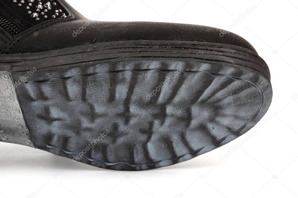 winter shoes soles on white background