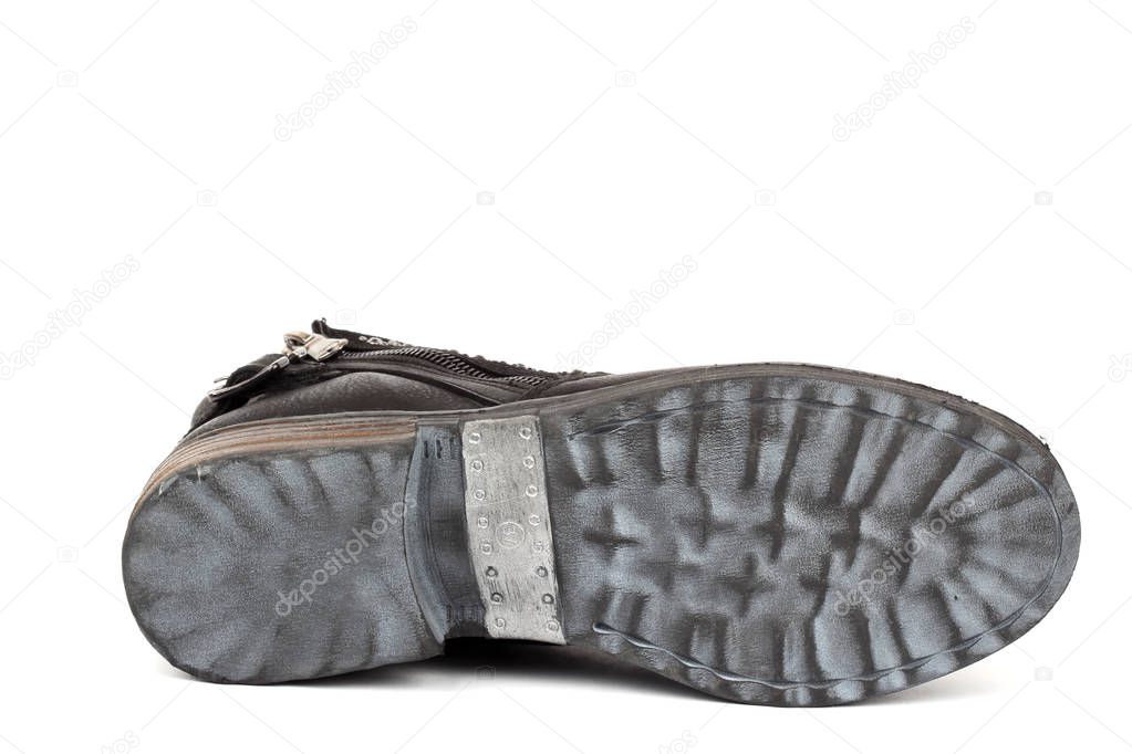 winter shoes soles on white background