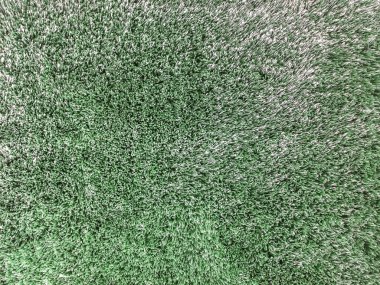 Ev dokulu arka plan katında koyu yeşil kumaş halı closeup yüzey soyut kumaş deseni