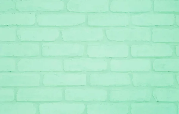 Closeup surface green brick wallpaper wall textured background
