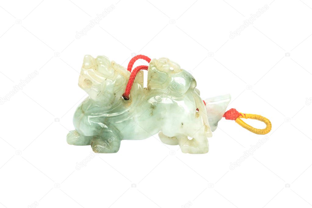 Closeup old green jade amulet for good fortune isolated on white background