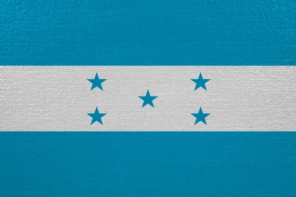 Honduras flag on canvas. Patriotic background. National flag of Honduras